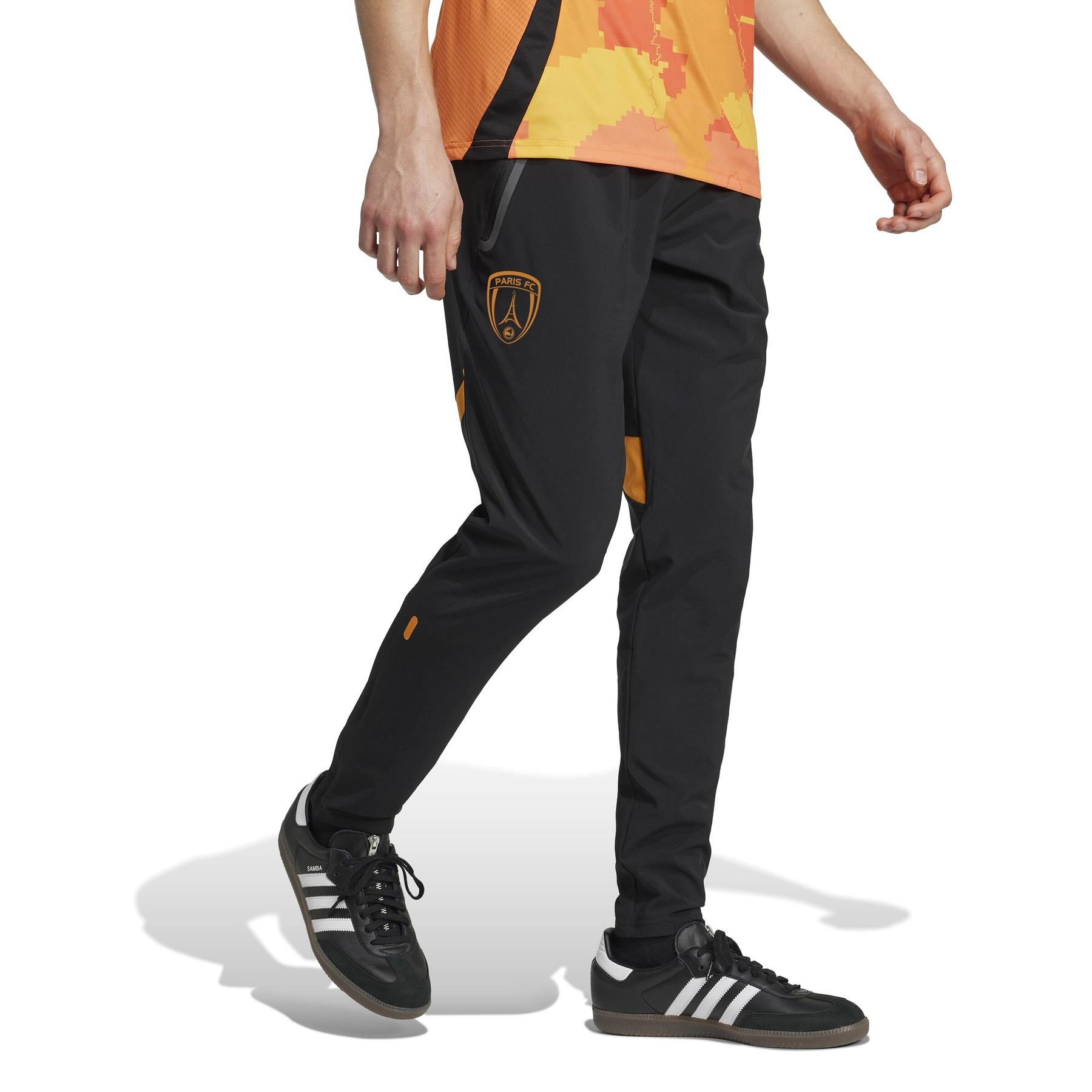 product/a/d/adidas_jm7307_4_apparel_on_model_walking_view_white.jpg