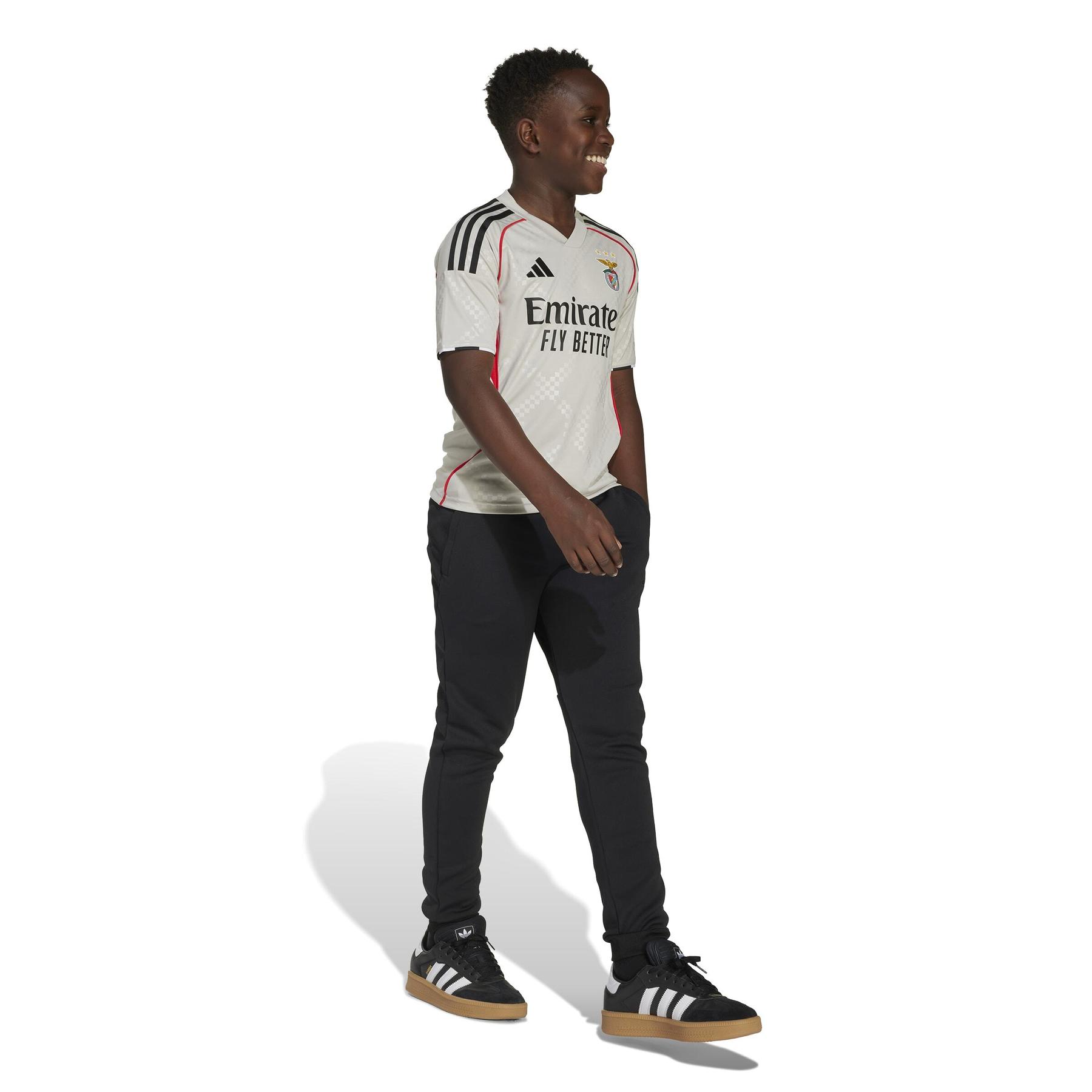 product/a/d/adidas_jn9947_5_apparel_on_model_walking_view_white.jpg